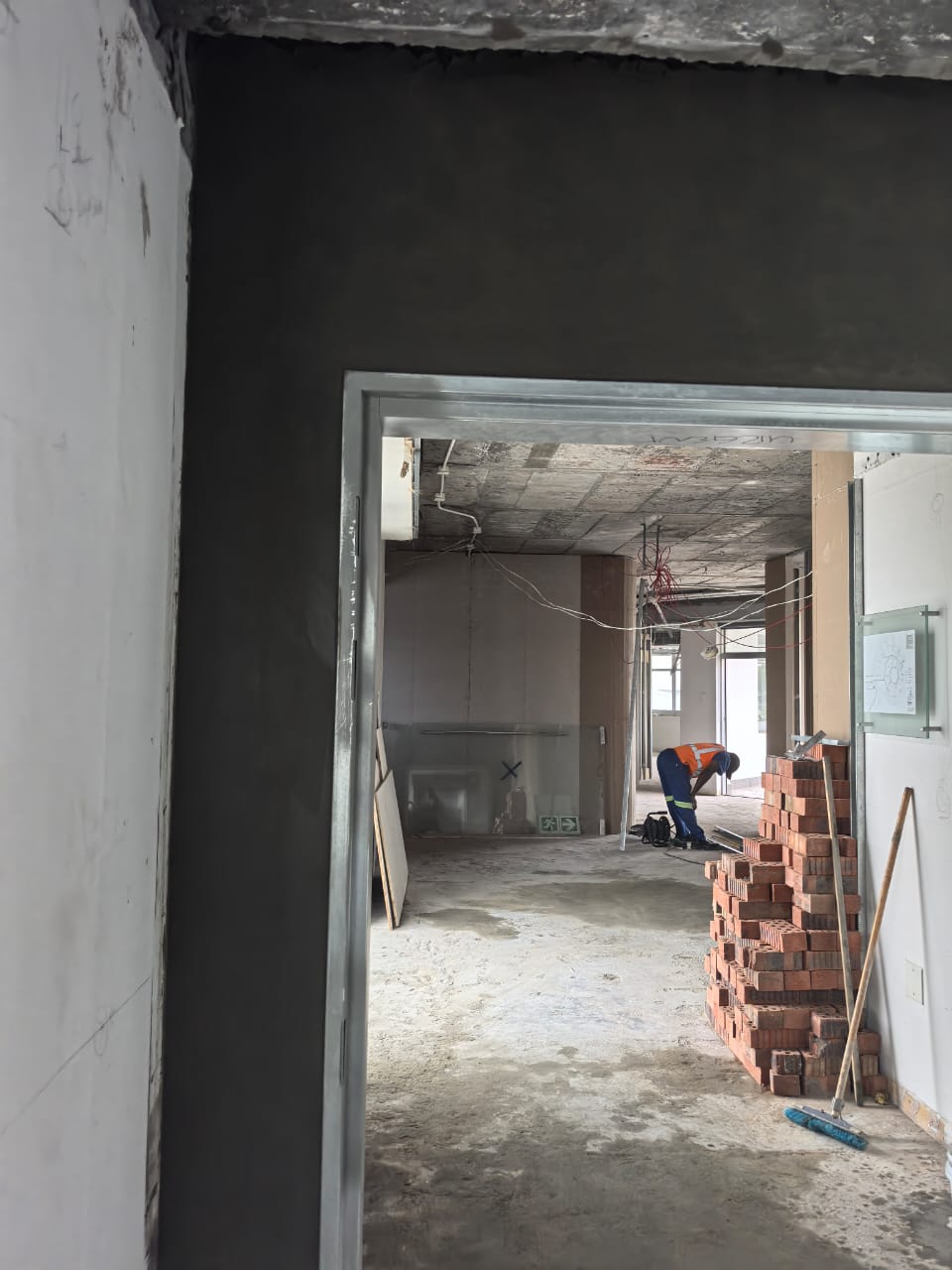 Pro Royal team building a new partition wall on site